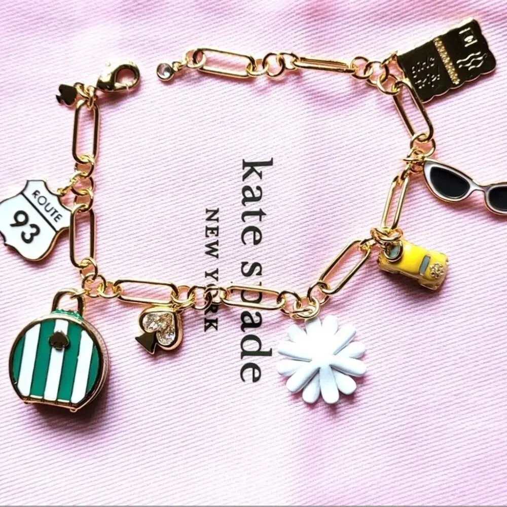 Kate Spade Gold off we go travel charm bracelet NWT -Dust Bag Included